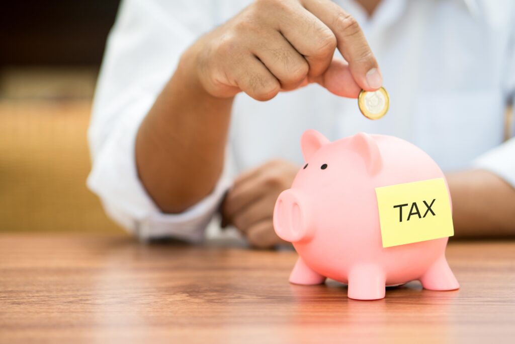 Piggybank savings with tax label